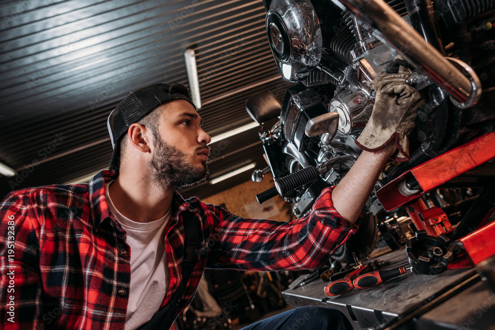 custom made wallpaper toronto digitalhandsome bike repair station worker fixing motorcycle