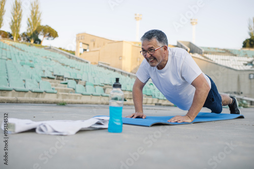 Older man making sport