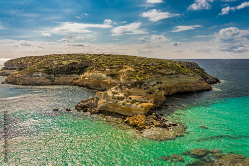 The Rabbit beach in Lampedusa, Pelagie islands is a wild beach, protected by WWF , for being home of the extinct loggerhead turtles, who lay theirs eggs in the area,  photo