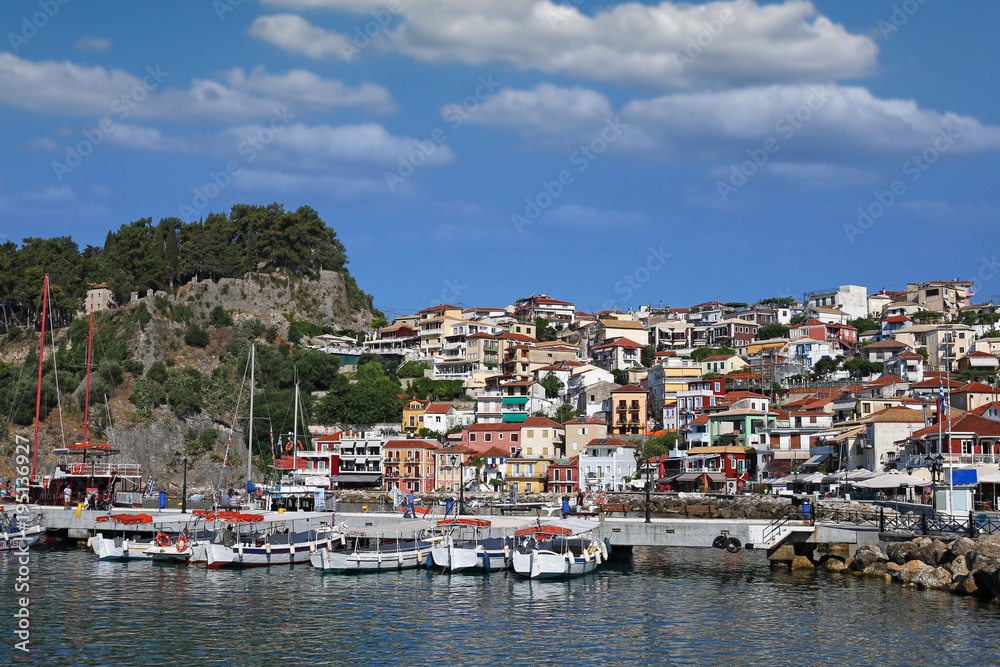 castle on hill and old colorful buildings Parga Greece