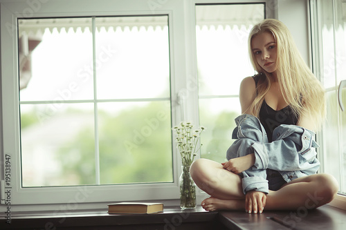 Home portrait of a young blonde girl Free Download Home portrait of a young blonde girl - GFXLoad