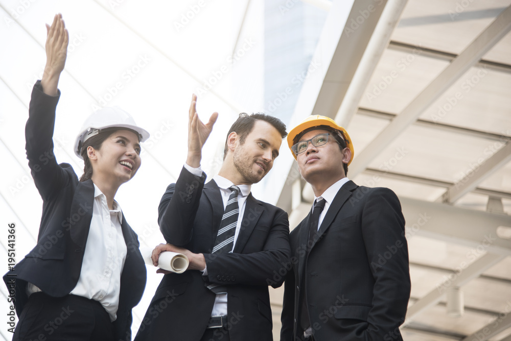 business engineer hand holding construction drawing. concept consulting planning for engineering. business engineer hand holding construction drawing. concept consulting planning for engineering.
