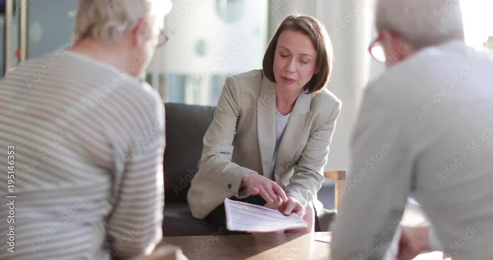 Senior couple with financial advisor