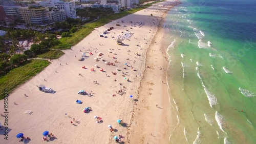 Miami Beach aerial view, flying over South Beach at sunset in Miami, Florida, United States. photo