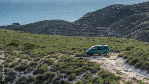 Small camper parked in a scenic location