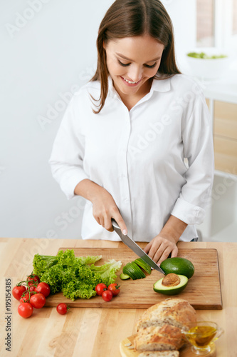 Healthy Diet. Woman Cooking Food, Cutting Vegetables For Salad