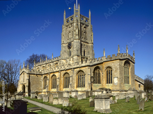 England, Cotswolds, Gloucestershire, historic Fairford church in spring sunshine photo