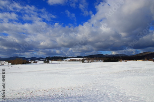 Fototapeta Naklejka Na Ścianę i Meble -  snowy meadow and cloudy sky in Pyreness. Aude  in south of France
