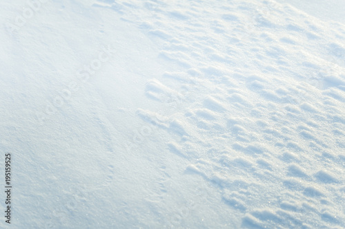 Beautiful fresh snow pattern in minimalistic style. Winter background. Norway, Northern Europe. Close up texture