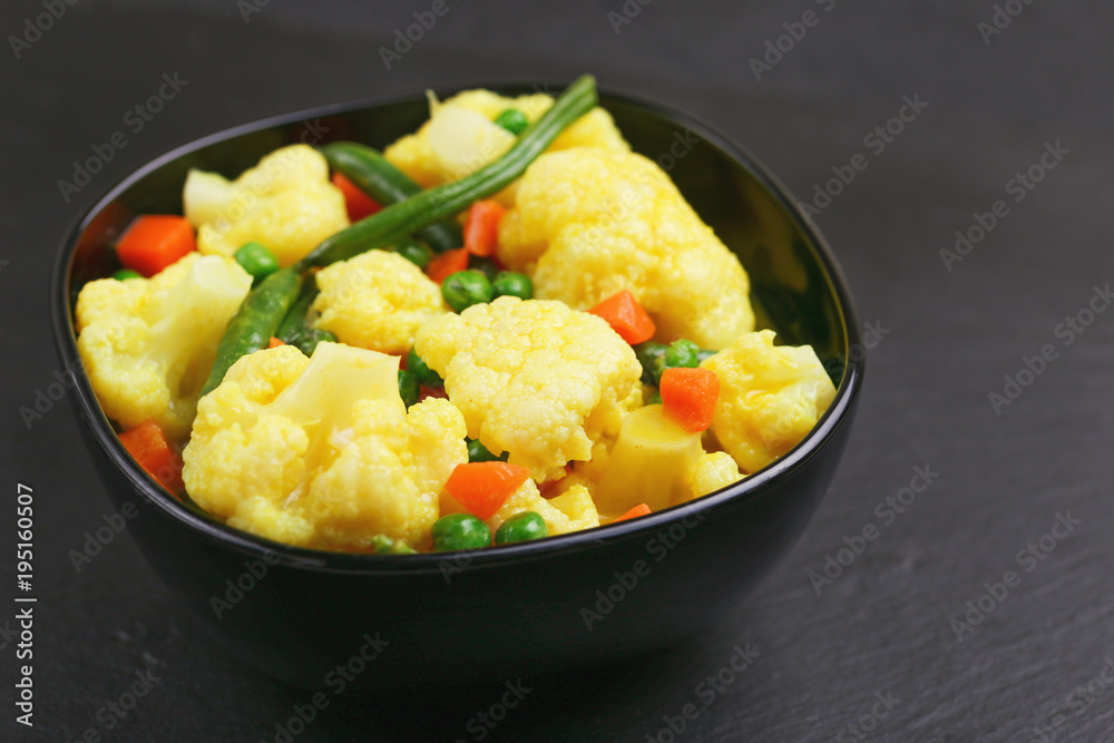 Indian Vegetarian curry Vegetable Korma. Copyspace, horizontal view Indian Vegetarian curry Vegetable Korma. Copyspace, horizontal view