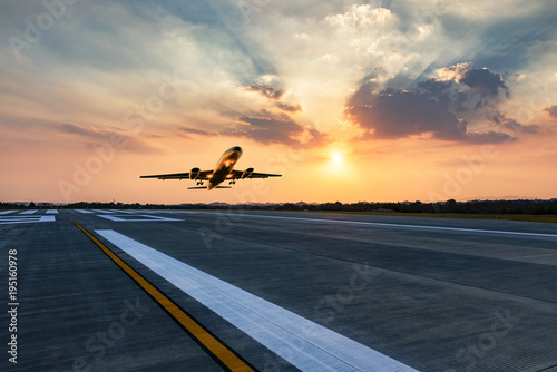 Photos passenger plane fly up over take-off runway from airport