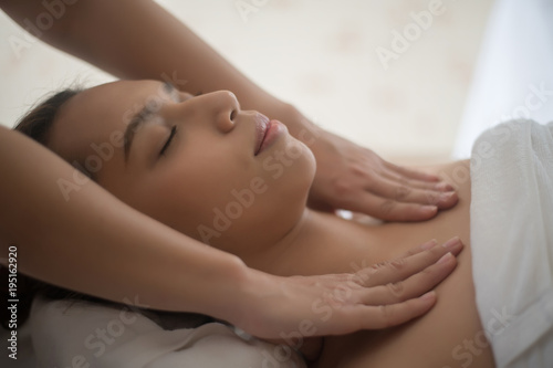 Beautiful young woman in spa salon massage, relax and healthy.