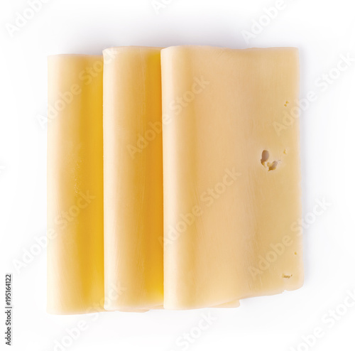 Cheese slices isolated on white, from above
