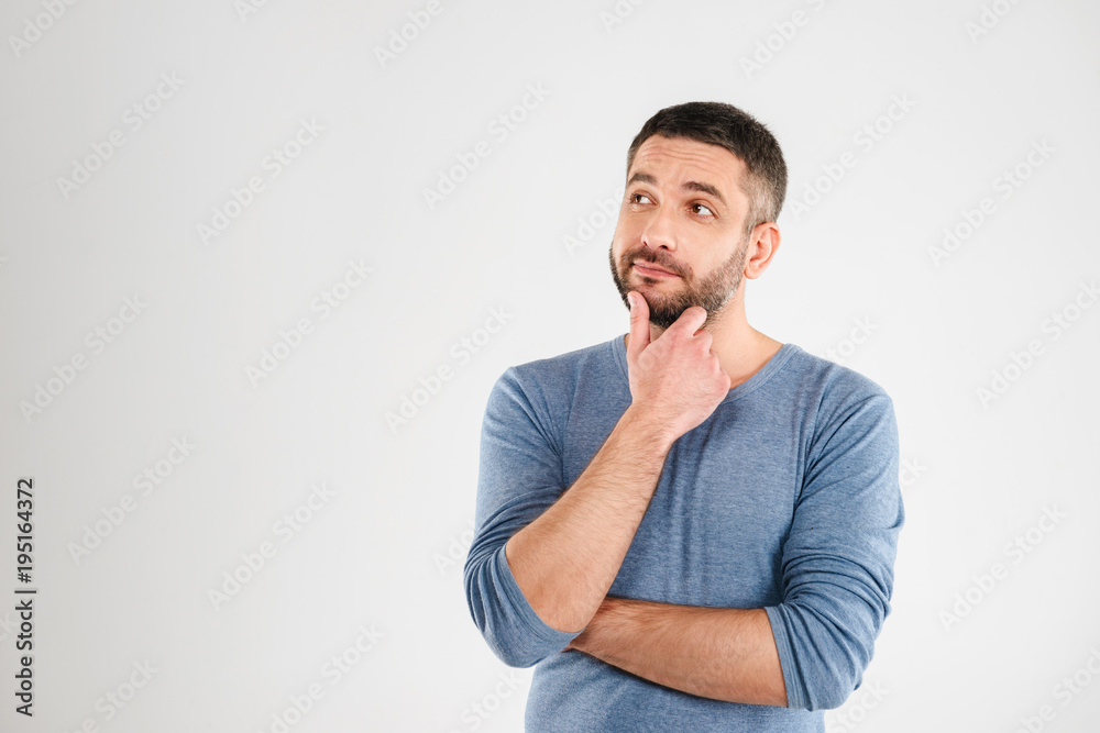 Thoughtful man isolated over white background