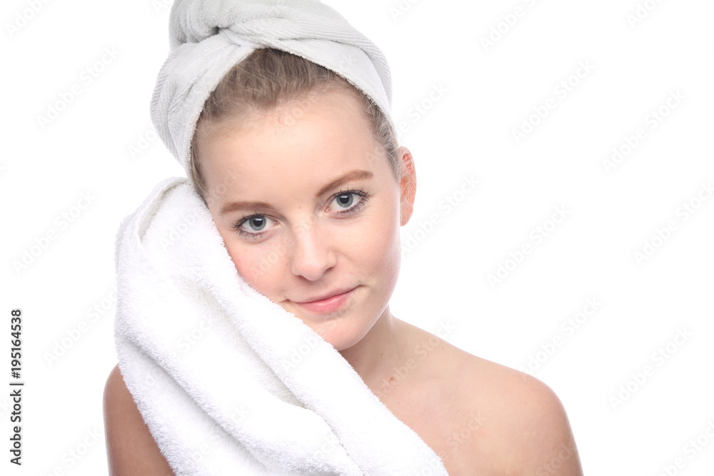 Beautiful young woman in towel after shower on white background Beautiful young woman in towel after shower on white background