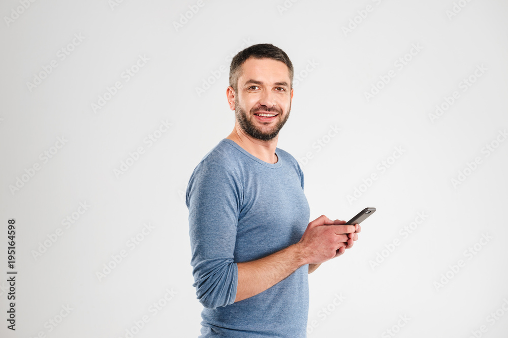 Happy man chatting by mobile phone. Happy man chatting by mobile phone.