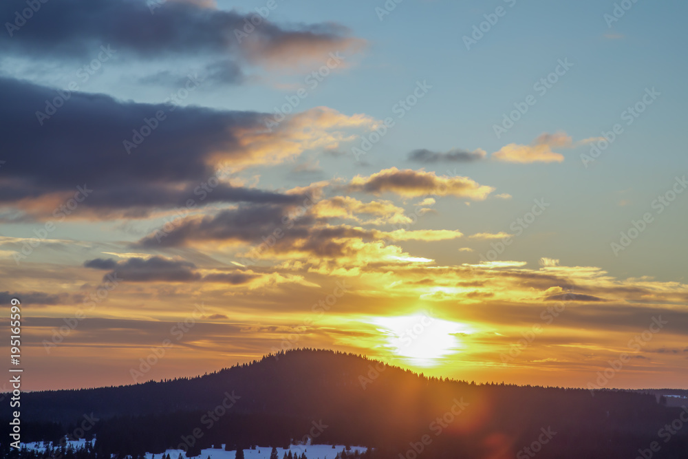 Fototapeta premium Snow landscape with sunset
