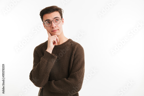 Close up portrait of a pensive young man in sweater