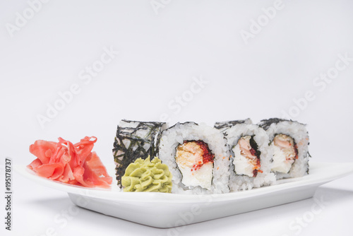 sushi rolls on white background, close-up, copy space