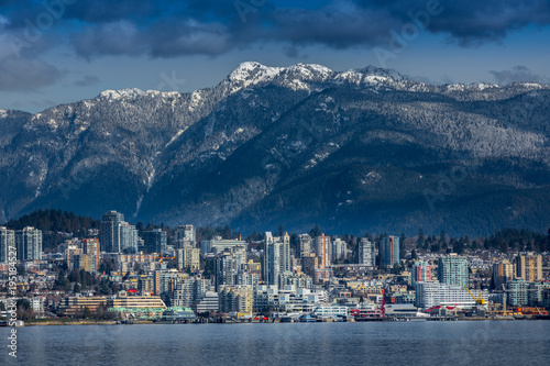 Rocky Mountains and buildings, North Vancouver, British Colombia, Canada.
