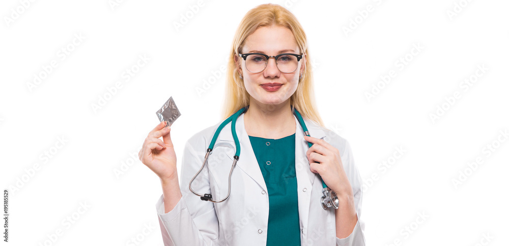 Woman doctor with stethoscope hold condom Woman doctor with stethoscope hold condom