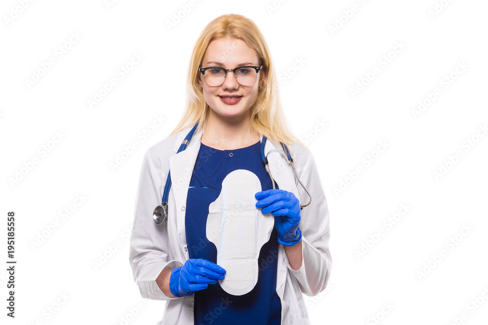 Woman doctor in latex gloves with menstrual pad Woman doctor in latex gloves with menstrual pad