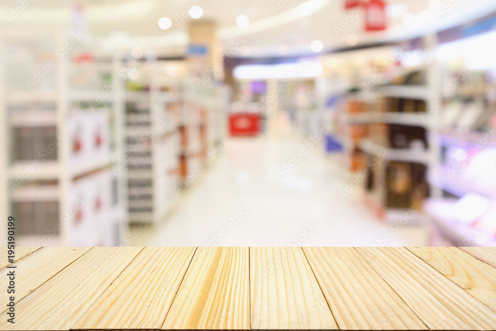 Abstract blur supermarket aisle with product shelves background