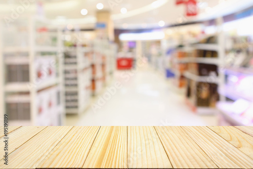Abstract blur supermarket aisle with product shelves background