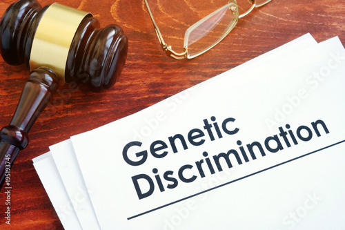 Papers about Genetic Discrimination and gavel. photo