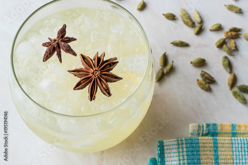 Cardamom Cocktail with Anise Star and Crushed Ice. photo