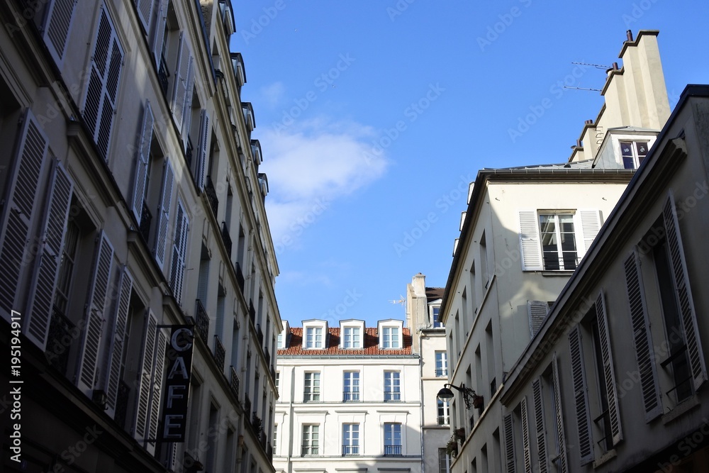 the sky around buildings in Paris