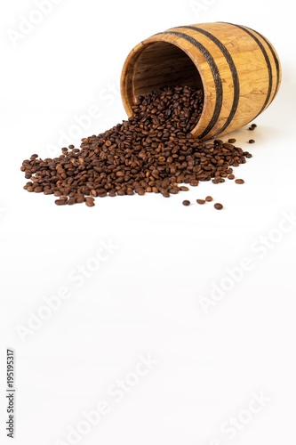 barrel with crumbled coffee beans on white background