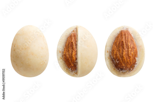 Sugared almond dragee in white chocolate isolated on white background photo