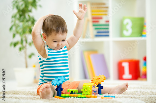 toddler boy playing indoors...