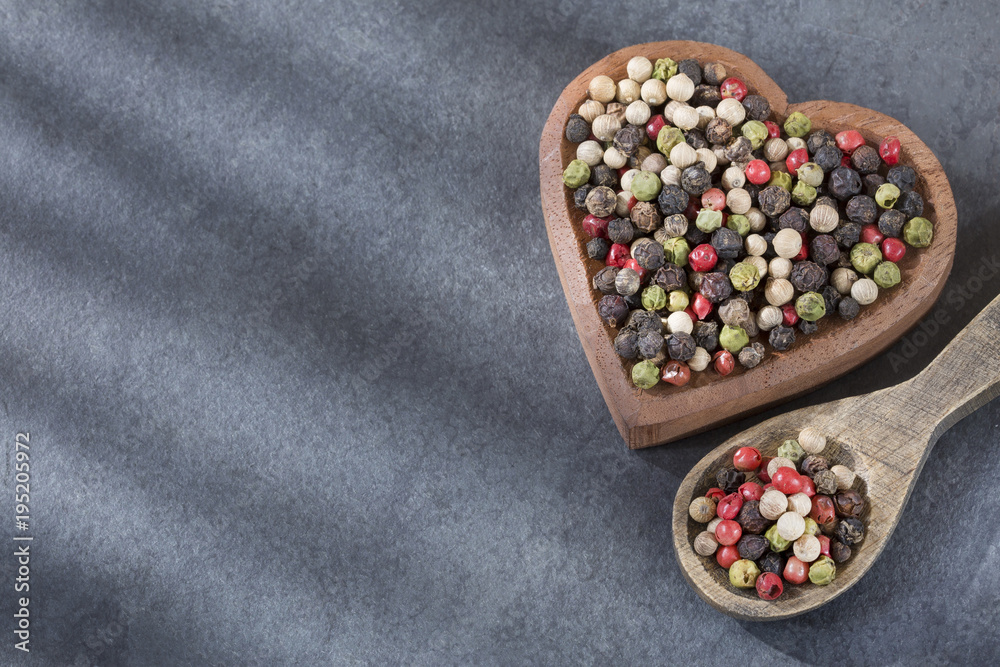 Mixed pepper color on rustic background Mixed pepper color on rustic background