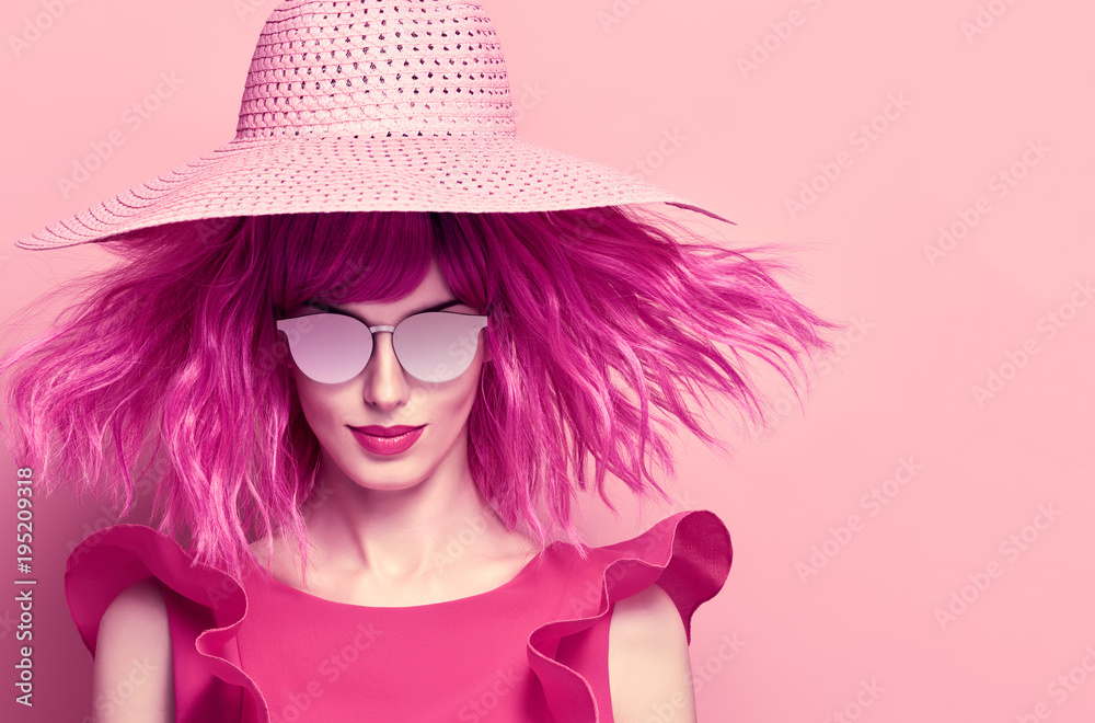 Glamour Beautiful Lady. Party fashionable Hairstyle. Fashion woman in pink Summer Dress. Young Playful female model with Pink Hair in Stylish fashion Hat. Trendy Sunglasses. Glamour Beautiful Lady. Party fashionable Hairstyle. Fashion woman in pink Summer Dress. Young Playful female model with Pink Hair in Stylish fashion Hat. Trendy Sunglasses.
