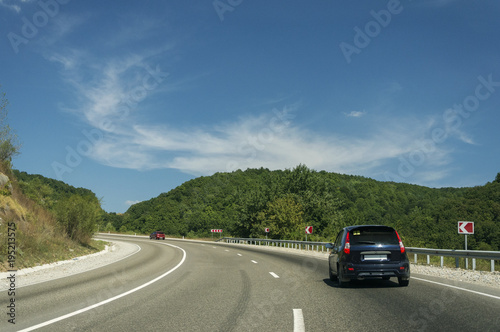 Mountain road at hight speed drive downhill © Sannikov Dmitriy