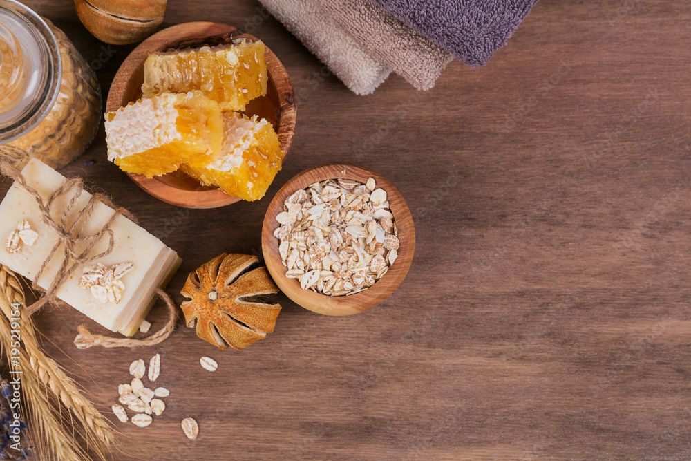 Fototapeta premium Honeycomb, sea salt, oatmeal and handmade soap with honey