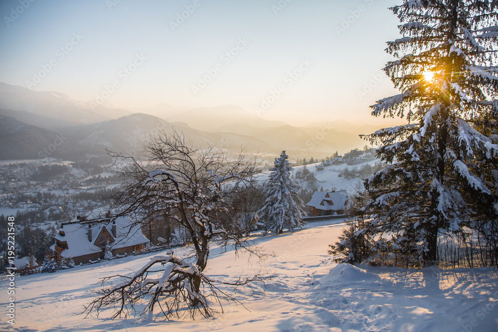 Obraz premium Winter landscape and sunset over Gubalowka mount, ski resort Zakopane, Poland