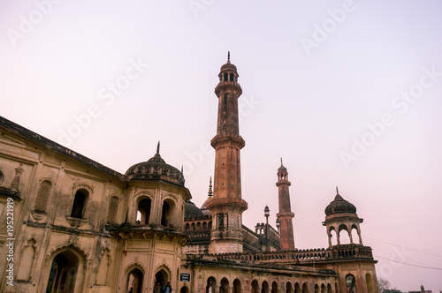 Lucknow, India: 3rd Feb 2018: The entrance and gardens of the bara imambara. The spires and dome of the main building and the beautiful well maintained grounds make this a famous tourist spot.