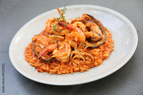 seafood risotto with mussel shrimp and squid , italian food