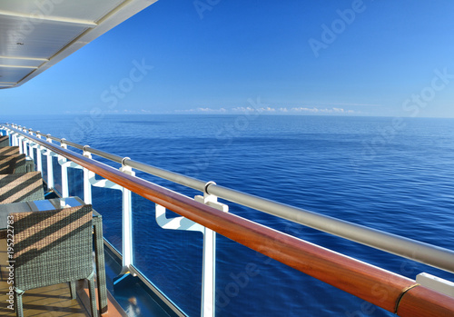 Restaurant tables on the open deck of cruise ship