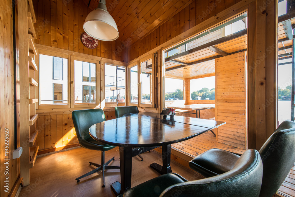 Fototapeta premium Table made of piano in luxury kitchen of log cabin