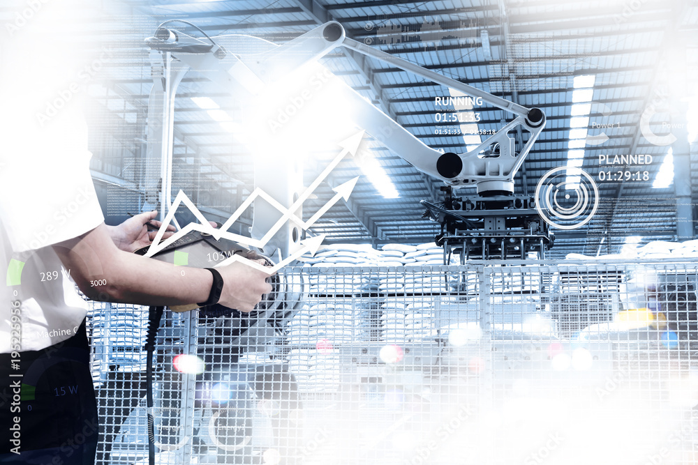 Engineer hand using tablet with machine real time monitoring system software. Automation robot arm machine in smart factory automotive industrial Industry 4th iot , digital manufacturing operation. Engineer hand using tablet with machine real time monitoring system software. Automation robot arm machine in smart factory automotive industrial Industry 4th iot , digital manufacturing operation.