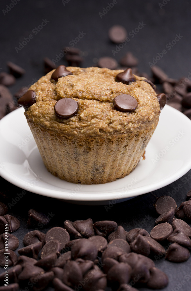 Fototapeta premium Homemade Chocolate Chip Muffins on a Slate Tabletop