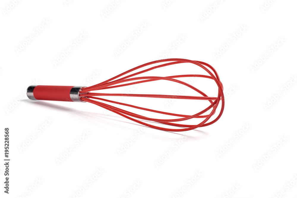Red plastic kitchen whisk isolated on white background Red plastic kitchen whisk isolated on white background