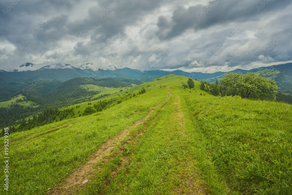 Fototapeta premium Colorful summer sunset in mountains