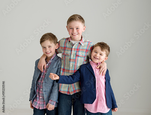 Happy brothers standing