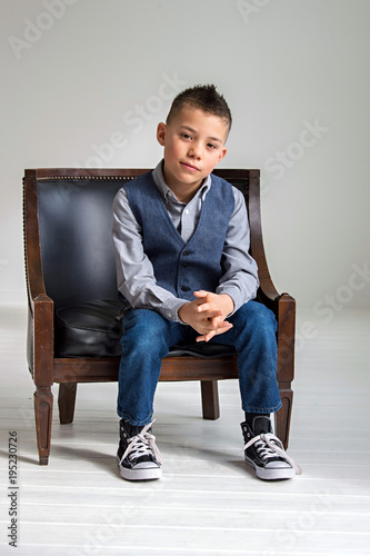 Boy sitting in chair