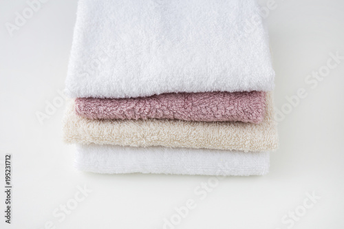 on a white table color towels